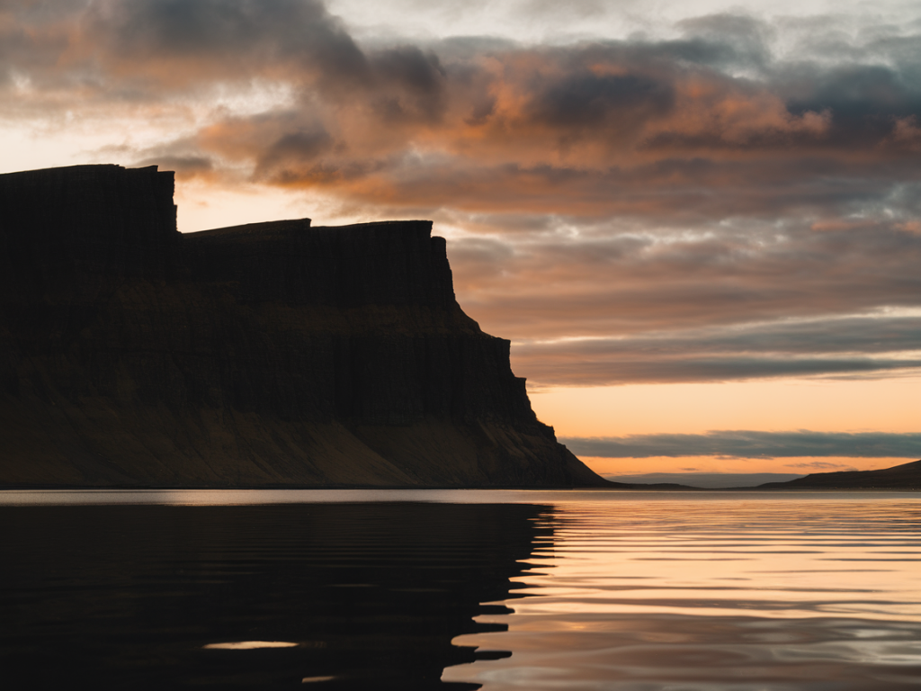 Where to find landmark photo spots for dramatic cliff silhouettes near hillside durness co